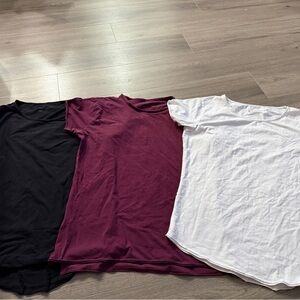 Alphalete Set of Three T-Shirts in Black, Burgundy, and White Large